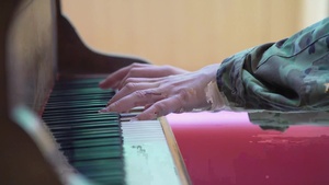 Broll and interviews of Airman playing piano at hospital