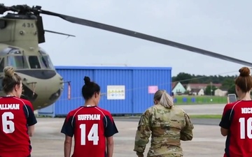 Members of the U.S. Women's Olympic Soccer Team visit an all female flight crew with the 12th Combat Aviation Brigade