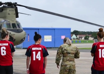 Members of the U.S. Women's Olympic Soccer Team visit an all female flight crew with the 12th Combat Aviation Brigade