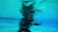 Service members are introduced to scuba gear