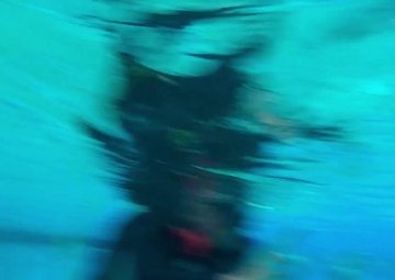 Service members are introduced to scuba gear