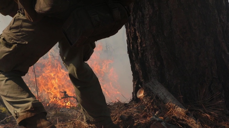 Former Wildland Fire-Fighter, now a member of the U.S. Army, returns to a fire line on the Dixie Fire