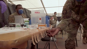 RAB medical personnel administer vaccines to evacuees,