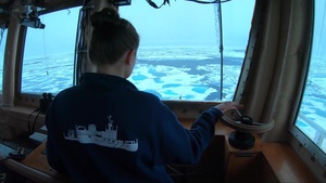 Coast Guard Cutter Healy crewmembers break through Arctic ice