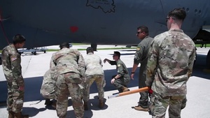 Members of the THAAD receive a tour of the B-52H Stratofortress