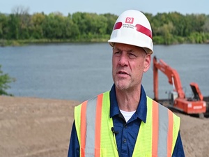 Dredged material lifts development area out of floodplain