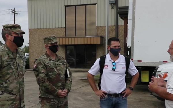 COL Kevin Golinghorst tours warehouse facilities of Blue Roof contractors
