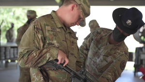 Airmen and Guardians receive weapon instruction at BMT