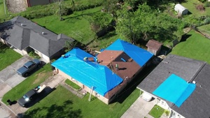 Drone - USACE installs 20,000th blue roof in Houma, LA