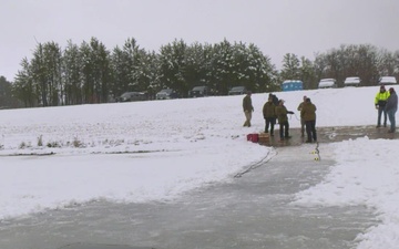 Cold water immersion training during Cold Weather Operations Course class 21-02 at Fort McCoy, Wisconsin