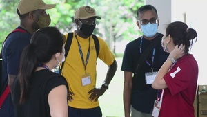 CTF 73/COMLOG WESTPAC Chief Selects, U.S. Embassy Singapore Officers Deliver Care Packages During American Chamber of Commerce (AmCham) Volunteer Event