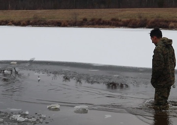 Marine participates in cold-water immersion training at Fort McCoy during CWOC, Part III