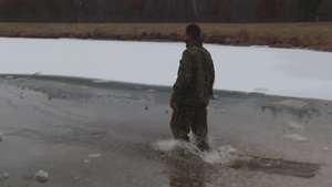 Marine participates in cold-water immersion training at Fort McCoy during CWOC, Part VI