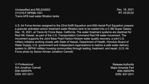 Travis AFB load water filtration tanks