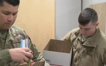 Iowa Air Guard members pack holiday care packages for family members of deployed