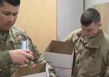 Iowa Air Guard members pack holiday care packages for family members of deployed