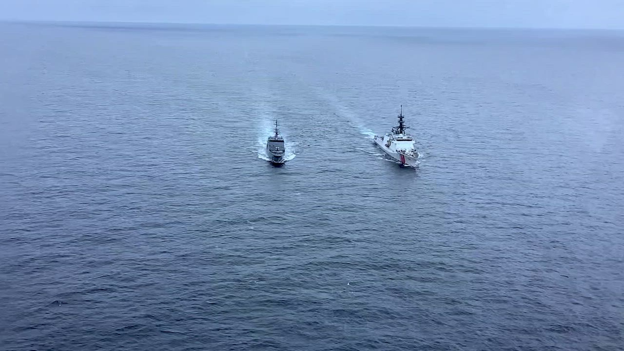 The crews of U.S. Coast Guard Legend-class national security cutter USCGC Stone (WMSL 758) and the Colombian navy OPV-80 offshore patrol vessel ARC Victoria (PZE-48) conduct passing exercises in the Eastern Pacific Ocean, Dec. 4, 2021. The U.S. and Columbia have signed agreements on trade, environmental protection, asset sharing, chemical control, ship-boardings, renewable and clean energy, science and technology, and civil aviation. (U.S. Coast Guard photo by Petty Officer 2nd Class Shannon Kearney)