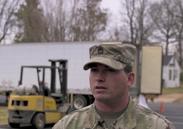 Kentucky National Guard sets up food and water point for tornado victims