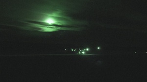 Illinois Air National Guard lands C-130 at night