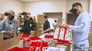 Holiday Food Basket Packing at the Hickam Commissary
