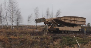 1BEB deploys a Heavy Assault Scissor Bridge for river crossing operations during Winter Shield 2021 BROLL