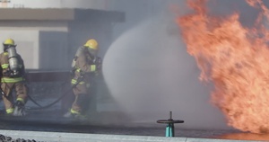 Aircraft Rescue and Firefighting Marines execute emergency response training