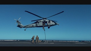 EODMU2 Conducts Fast-Rope Aboard USS Harry S. Truman
