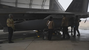 Maintainers prepare F-22 Raptors for deployment to the United Arab Emirates