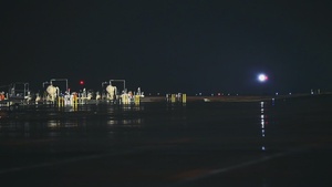 60th Jet Arrival on a Rainy Night