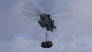 U.S. Marine heavy helicopters lift heavy loads for British counterparts in Norway (B-Roll)