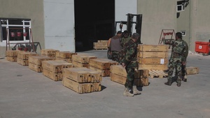 Coalition advisors attend ammunition distribution