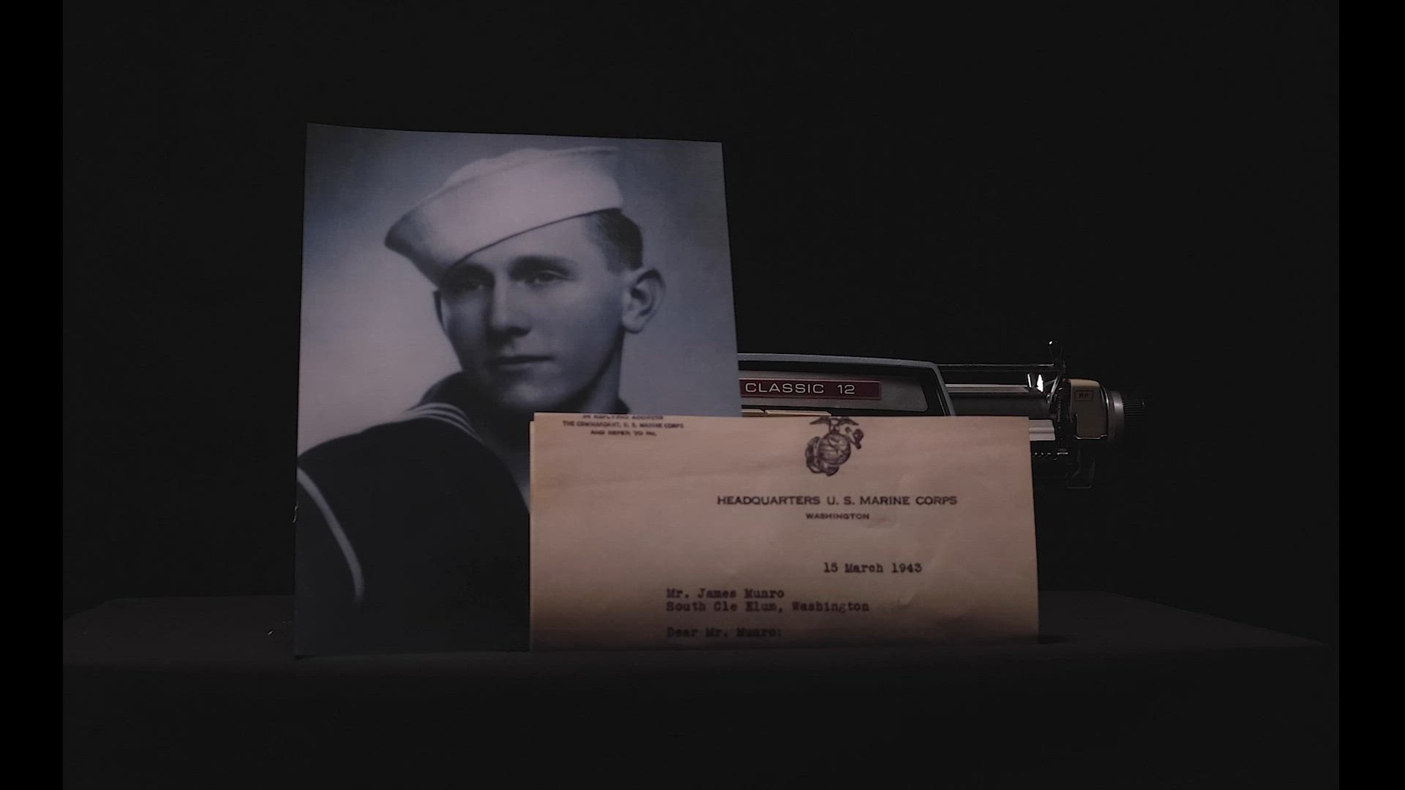 Marine Master Sgt. James W. Hurlbut writes to the parents of Coast Guard Signalman First Class Douglas Munro explaining how Munro gave his life to save others during the World War II battle at Guadalcanal, March 15, 1943. Munro is currently the only Coast Guardsman to be awarded the Medal of Honor. (U. S. Coast Guard video by Petty Officer 2nd Class Brandon Giles)