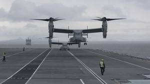 U.S. Marine Corps Ospreys practice landing on the HMS Prince of Wales