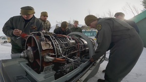 U.S. Marines handle million dollar helicopter engine in Bardufoss, Norway
