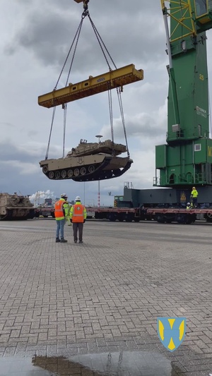 M1 Abrams lifted by crane