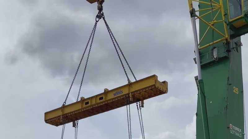 M1 Abrams lifted by crane