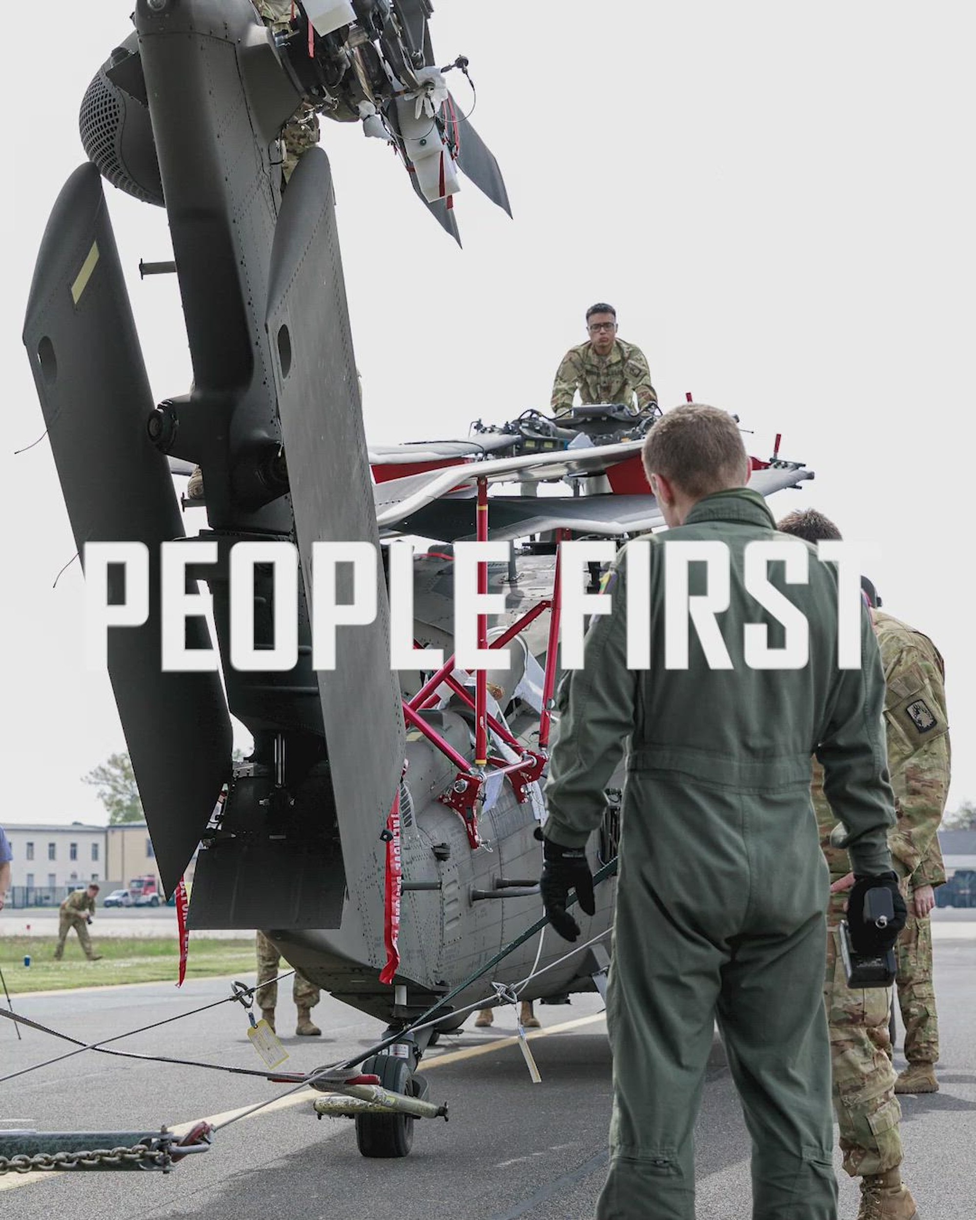 Soldiers fold Black Hawks for transport to Norway for Swift Response 22