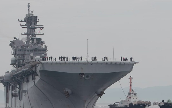 USS Tripoli docks at MCAS Iwakuni
