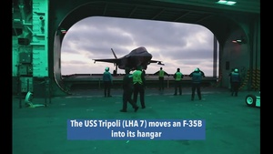 USS Tripoli (LHA 7) moves an F-35B into its hangar