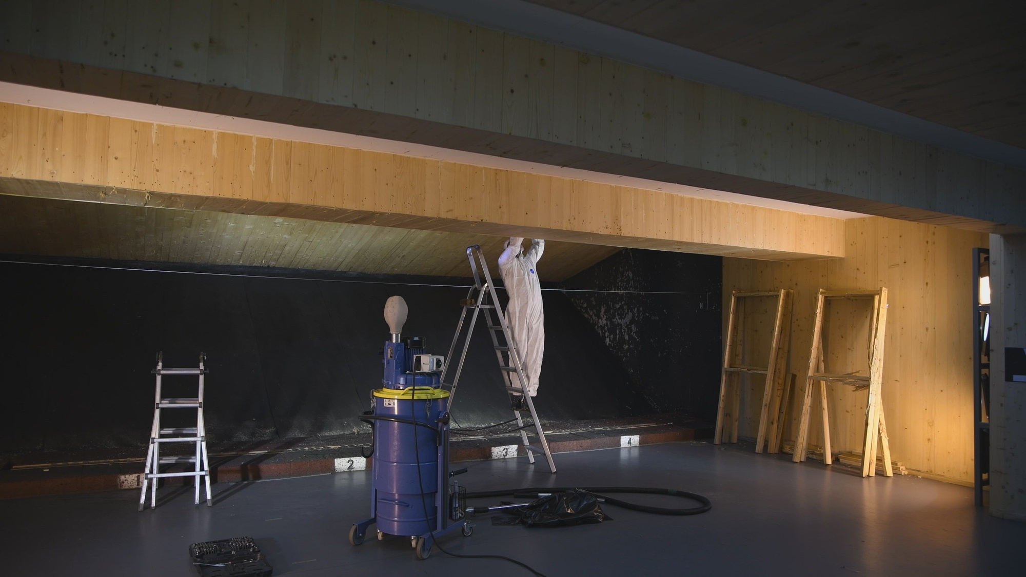 Brett Ritzmann, chief of Training Support Center Kaiserslautern / Benelux, conducts user level maintenance on the air filtration system of the indoor firing range, in Chièvres, Belgium, May 17, 2022. (U.S. Army video by Pierre-Etienne Courtejoie)