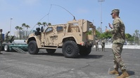 Soldiers unload a Joint Light Tactical Vehicle (JLTV)