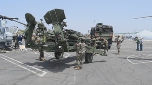 Marines unload a M777A2 Howitzer