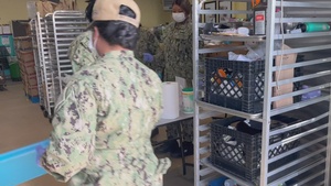 Sailors assigned to USS Portland (LPD 27) and Marines assigned to 15th Marine Expeditionary Unit volunteer at St. Francis Center