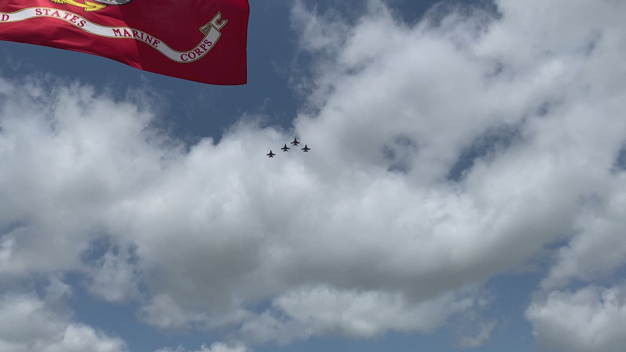Four F-16s from the 301st Fighter Wing at NAS Fort Worth JRB, Texas, flyover the Dallas-Fort Worth National Cemetery in a missing man formation, where the jets fly in a formation with a space where one jet should be, symbolizing the person's absence in honor of Memorial Day May 30, 2022. (U.S. Air Force video by Master Sgt. Lauren Kelly)