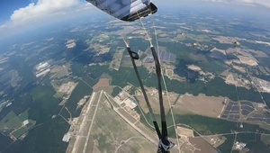 U.S. Army Parachute Team flies parachutes in high speeds maneuvers