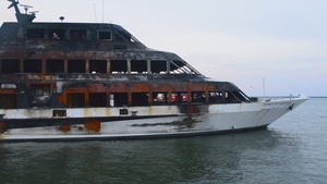 B-roll: Spirit of Norfolk Towed from Naval Station Norfolk