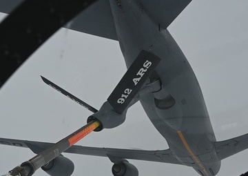 Kadena F-15 Eagles refuel with the 912th
