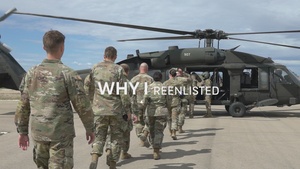 Soldier reenlists in a UH-60 Black Hawk