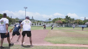USS Sampson Sailors and JS Izumo Sailors participate in a softball game during RIMPAC 2022