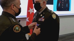 DCMA citizen soldier receives Purple Heart